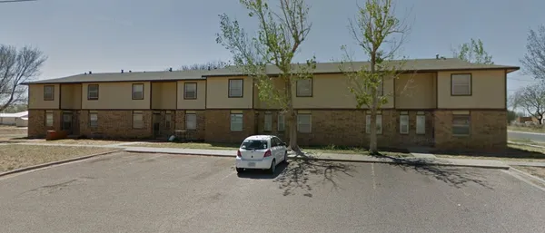 a view of two chairs in a room