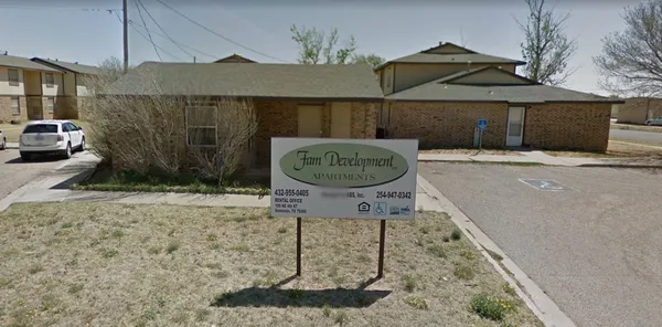 a table and chairs in a patio