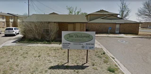 a table and chairs in a patio