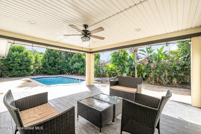 a outdoor living space with furniture and garden view