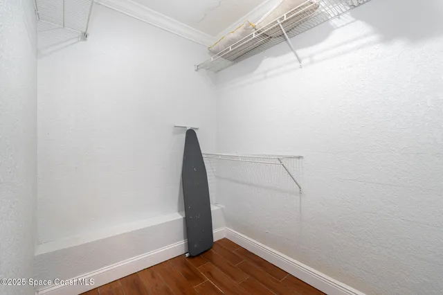 a view of small space with racks on the wall