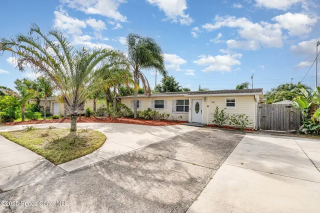 a view of a house with entertaining space