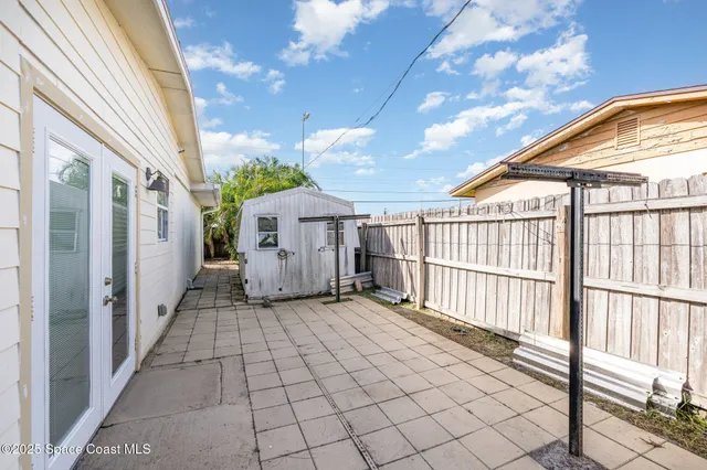 a view of a porch with a backyard