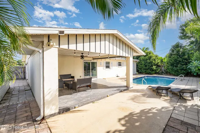 a front view of a house with a patio