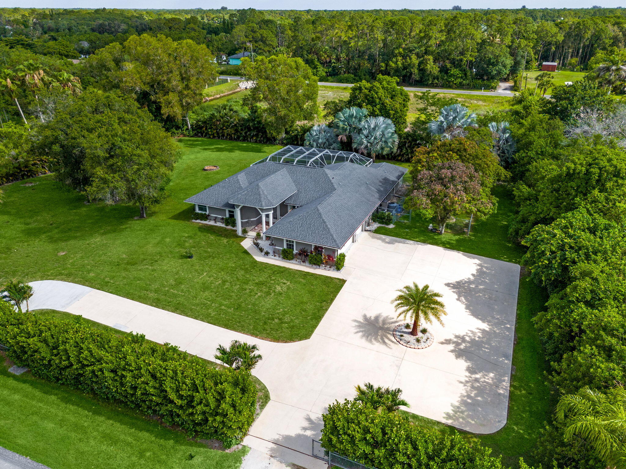 16685 63rd Road North Loxahatchee, FL 33470 - Photo 2 of 73 50-web-or-mls-DJI_20260525101340_0994_D