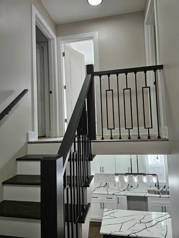 a view of entryway with wooden floor