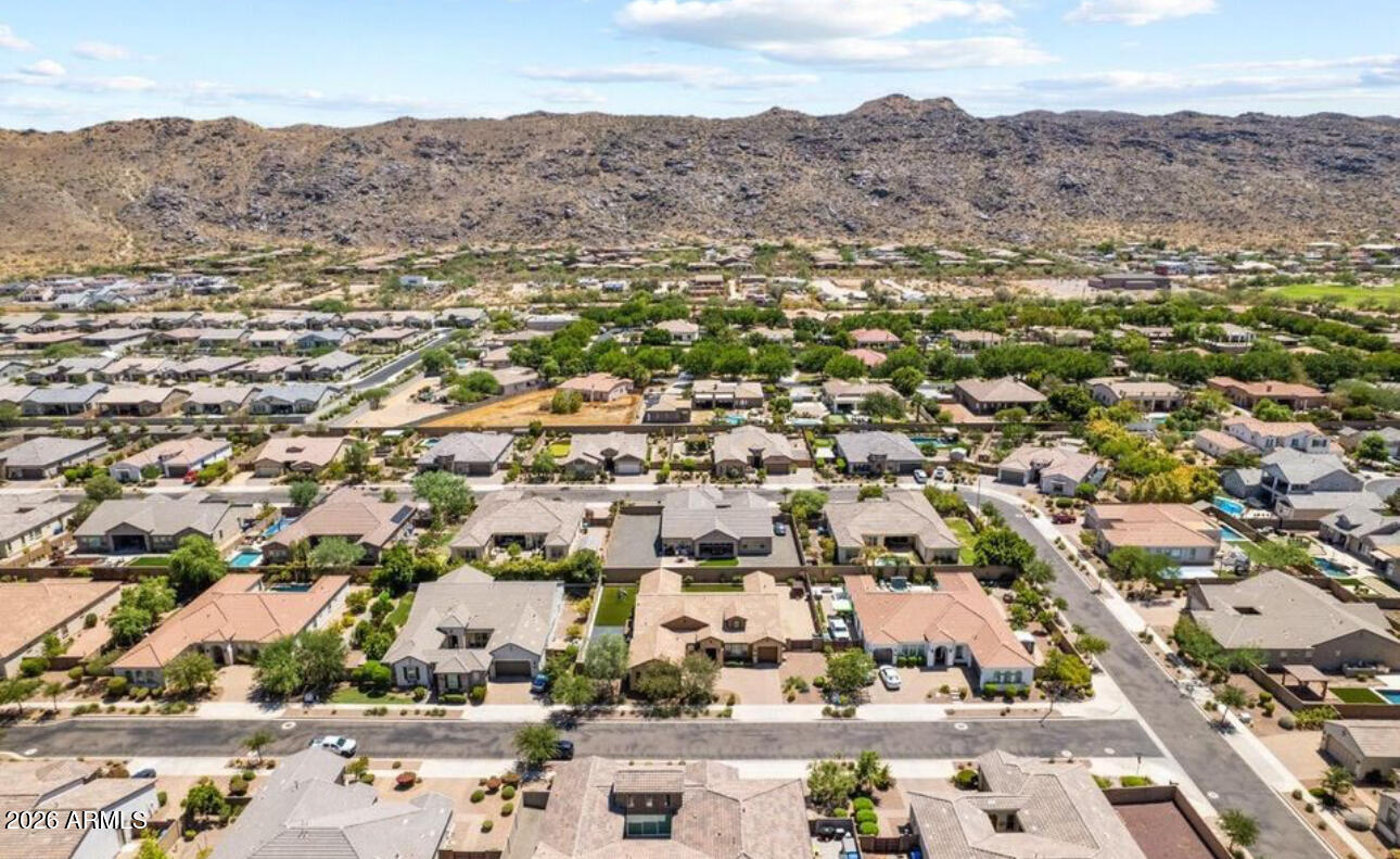 2915 East Constance Way Phoenix, AZ 85042 - Photo 12 of 47 an aerial view of residential houses with outdoor space and trees
