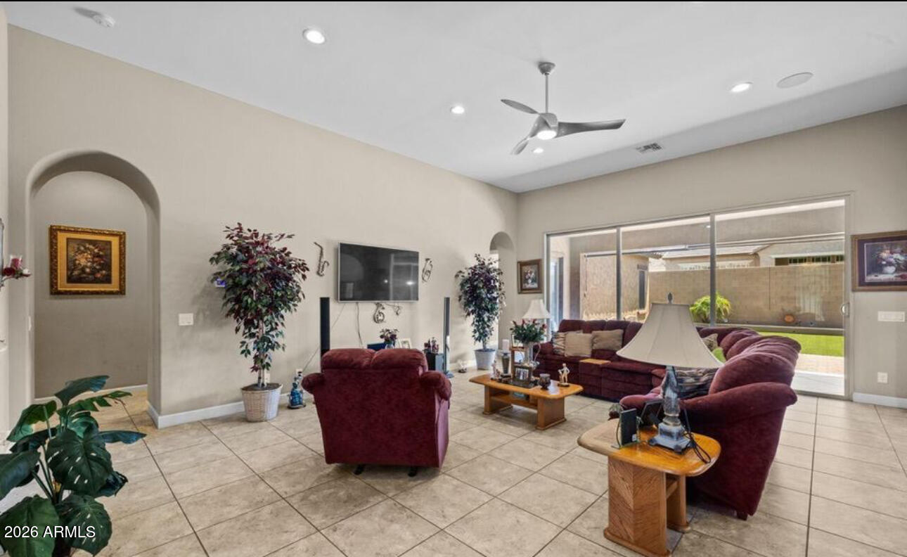 2915 East Constance Way Phoenix, AZ 85042 - Photo 15 of 47 a living room with furniture and a large window