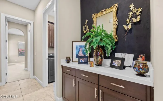 a bathroom with a sink a mirror and vanity
