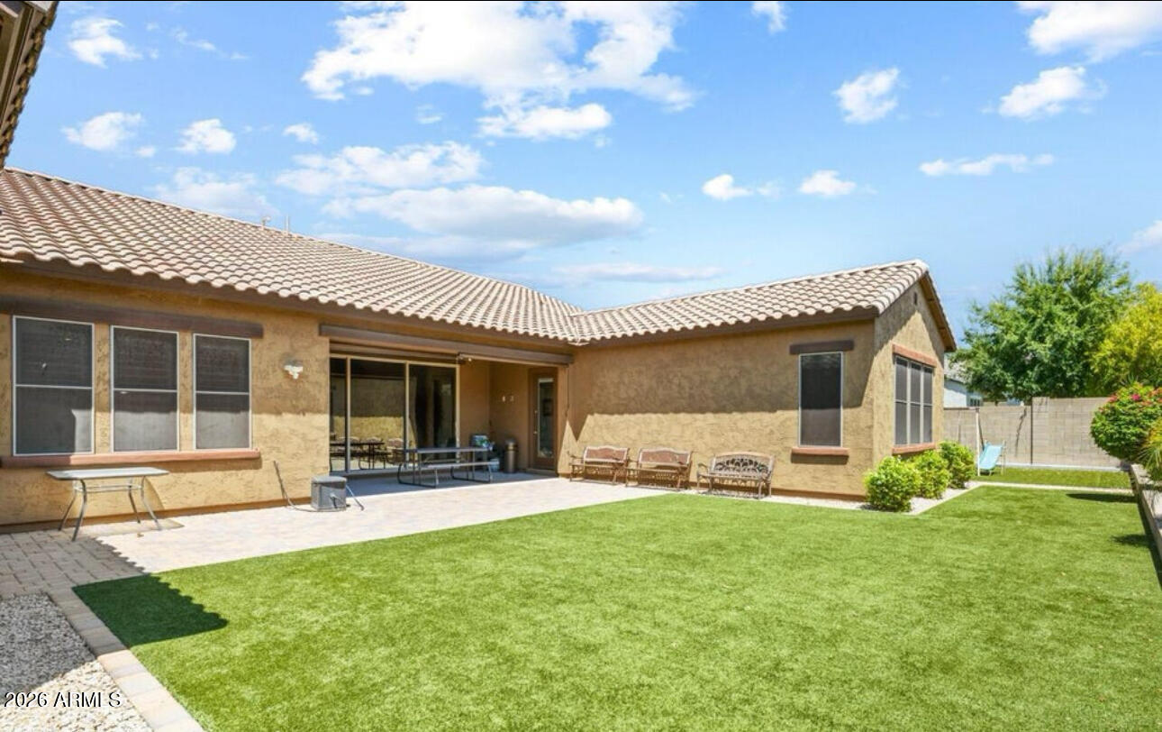 2915 East Constance Way Phoenix, AZ 85042 - Photo 41 of 47 a front view of house with a garden and plants