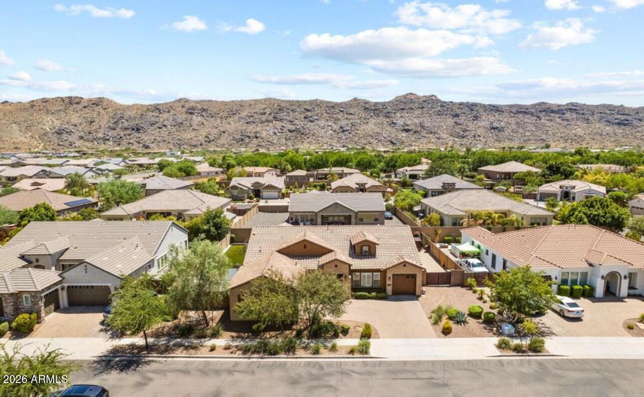 2915 East Constance Way Phoenix, AZ 85042 - Photo 45 of 47 an aerial view of residential houses with outdoor space and parking