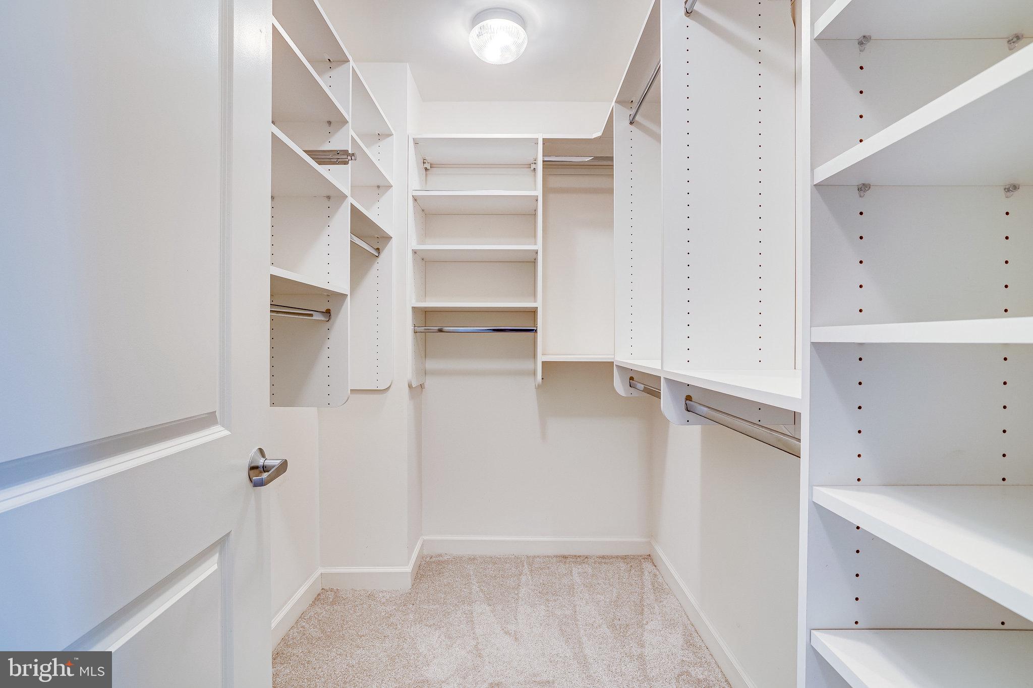 1830 Fountain Drive, Unit 1008 Reston, VA 20190 - Photo 17 of 42 Large walk-in closet with custom system.