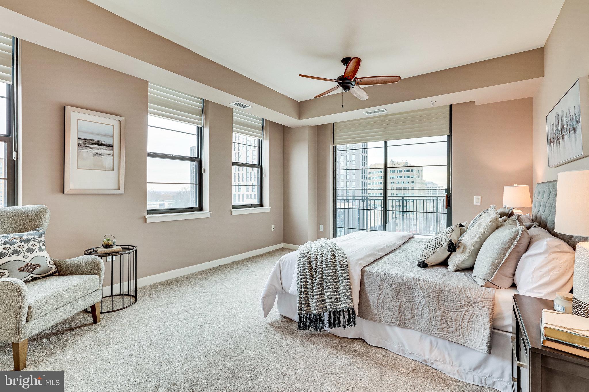 1830 Fountain Drive, Unit 1008 Reston, VA 20190 - Photo 18 of 42 Primary bedroom with balcony access.