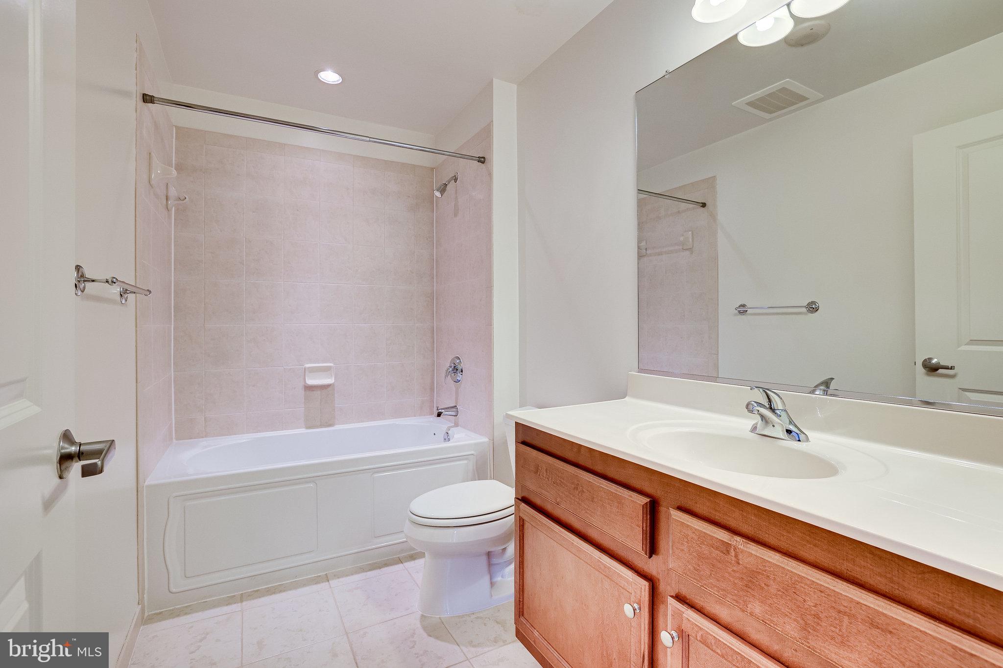 1830 Fountain Drive, Unit 1008 Reston, VA 20190 - Photo 29 of 42 3rd full bath in the guest bedroom suite.
