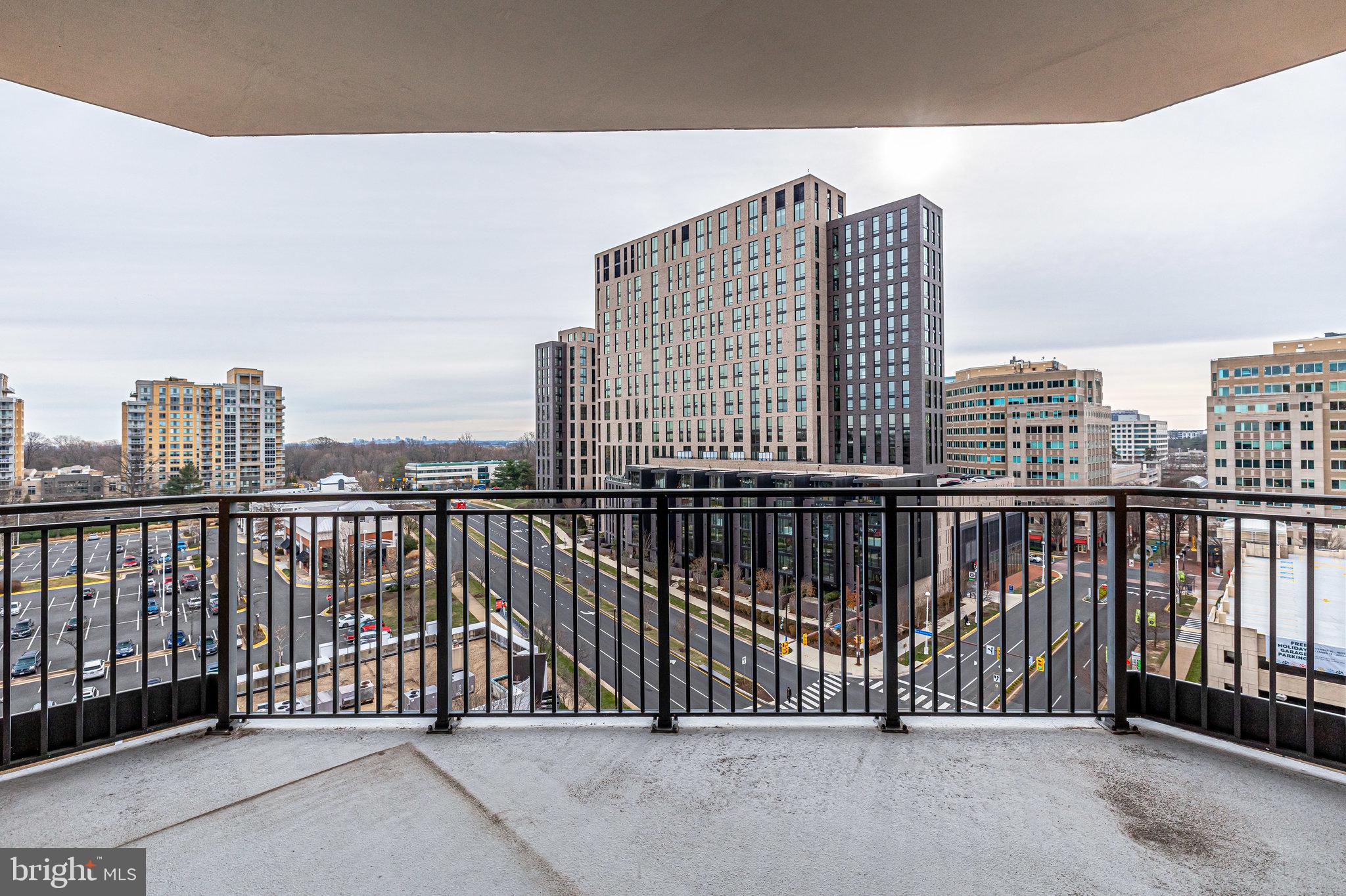 1830 Fountain Drive, Unit 1008 Reston, VA 20190 - Photo 3 of 42 Spacious covered balcony has town center views