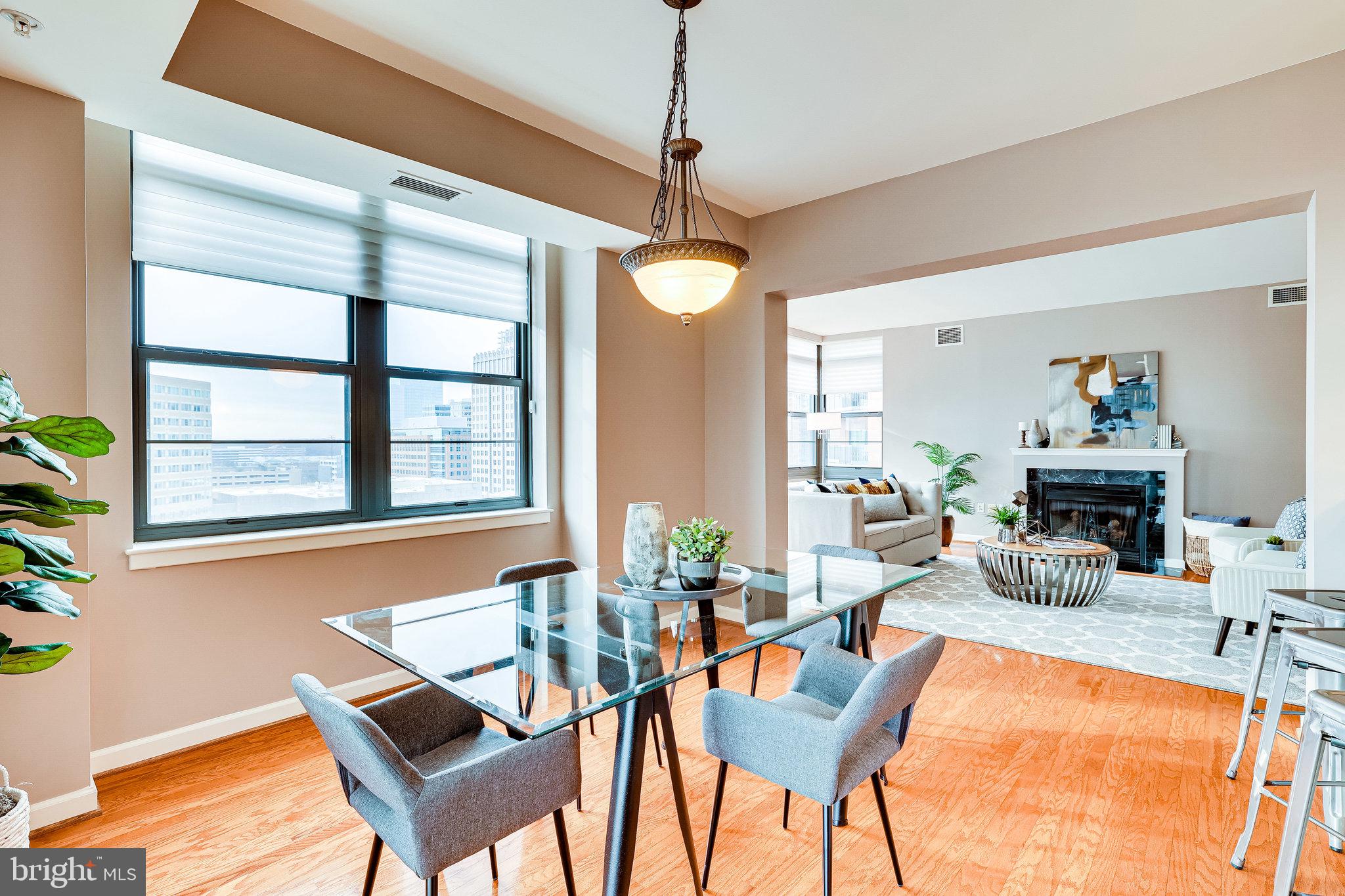 1830 Fountain Drive, Unit 1008 Reston, VA 20190 - Photo 4 of 42 Dining room opens to the living room and kitchen.