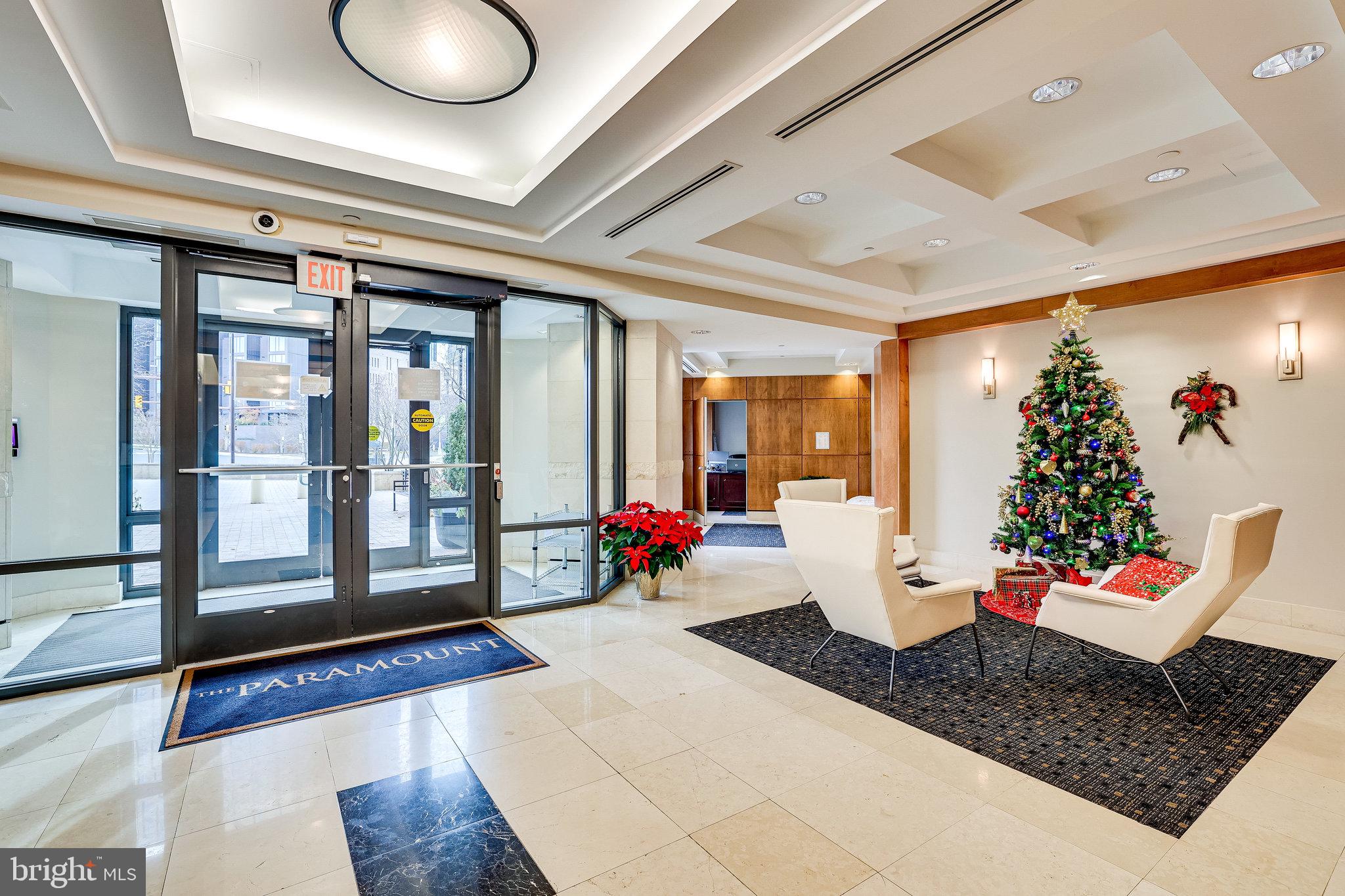 1830 Fountain Drive, Unit 1008 Reston, VA 20190 - Photo 41 of 42 Stunning building entrance.