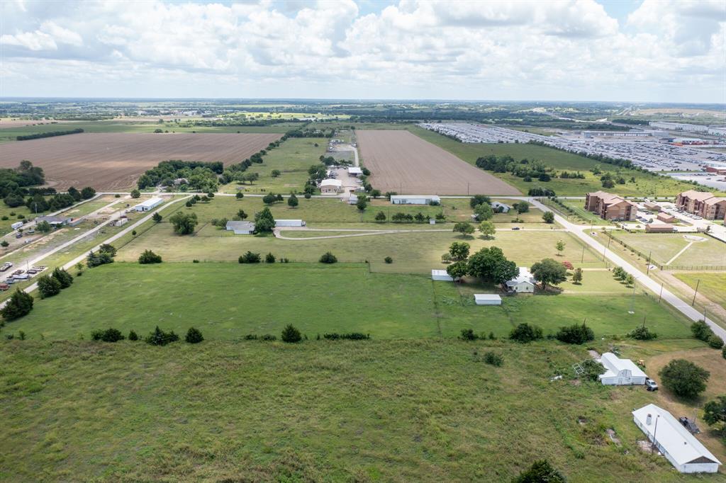 330 South Goode Road Wilmer, TX 75172 - Photo 8 of 38 an aerial view of a houses with outdoor space