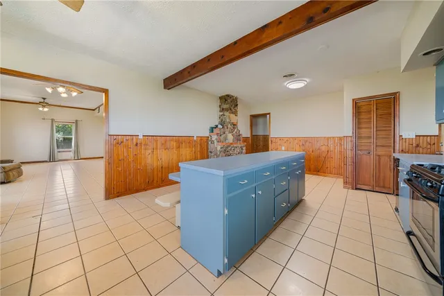 a view of a house with a yard and garage