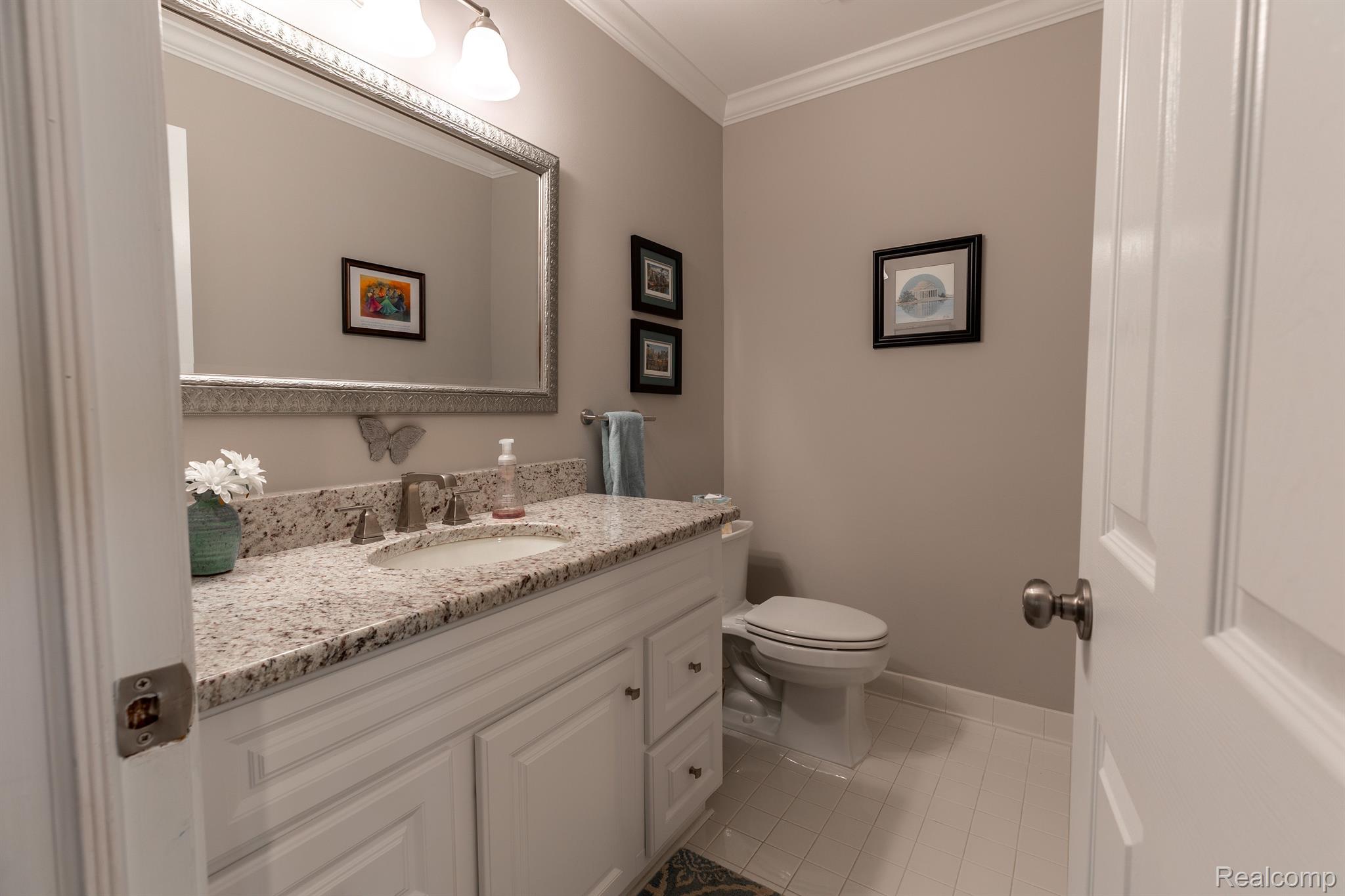 970 Golfview Court Rochester, MI 48307 - Photo 20 of 49 1st Floor Powder Room with granite countertops.