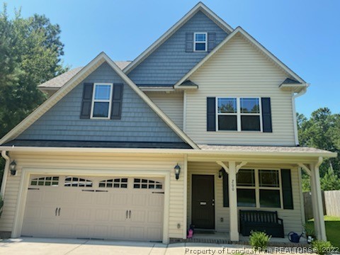 200 Pender Road Spring Lake, NC 28390 - Photo 1 of 9 a view of a blue house with large windows