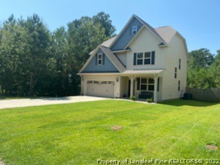 200 Pender Road Spring Lake, NC 28390 - Photo 3 of 9 a front view of a house with a yard