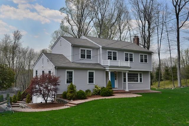 80 Minute Man Road Ridgefield, CT 06877 - Photo 1 of 1 a view of a house with a yard and a garden