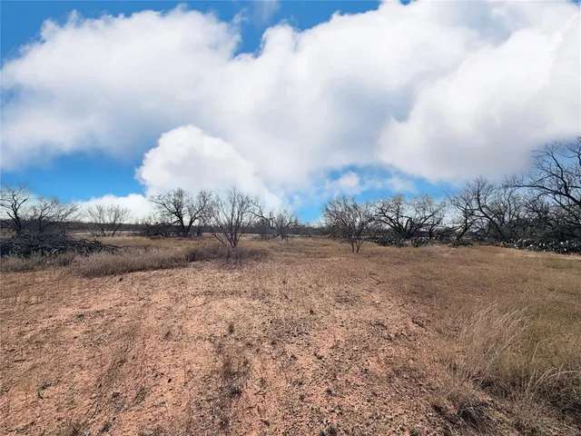 a view of a lake and covered with fog