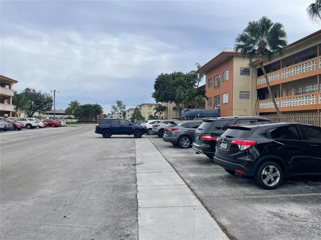 a view of a swimming pool with a lounge chairs