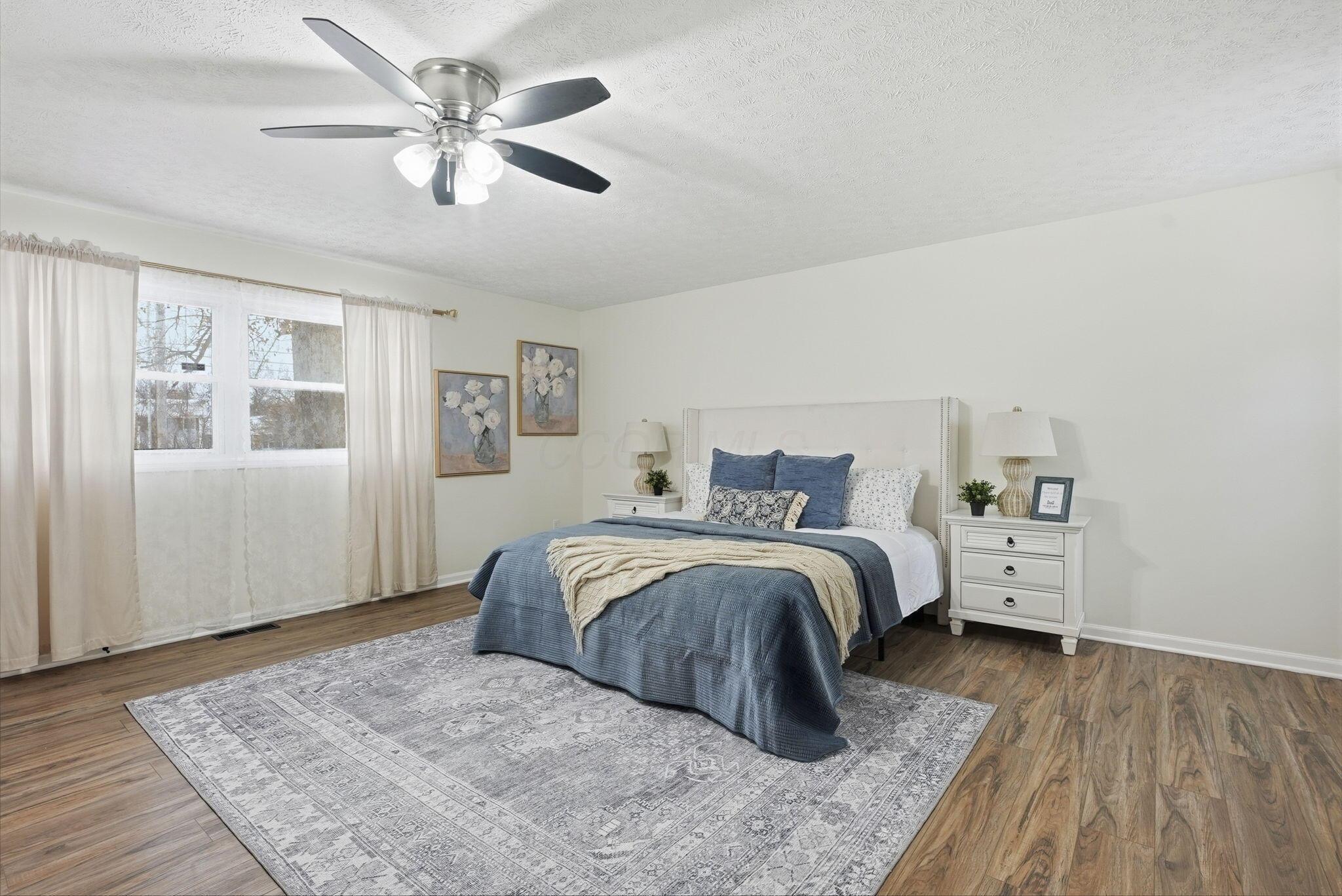 7097 Harlem Road Westerville, OH 43082 - Photo 27 of 76 First floor primary ensuite is huge!
