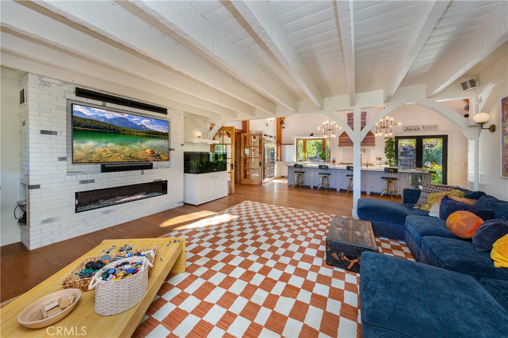 85 Saddlebow Road Bell Canyon, CA 91307 - Photo 11 of 75 a living room with furniture and a flat screen tv