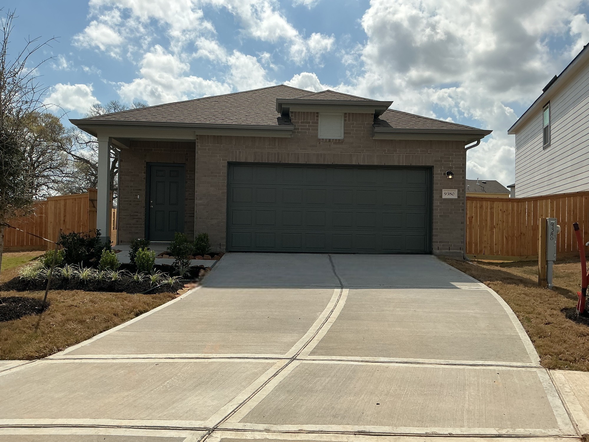 9380 Beryl Lane Conroe, TX 77303 - Photo 1 of 9 a front view of a house with yard