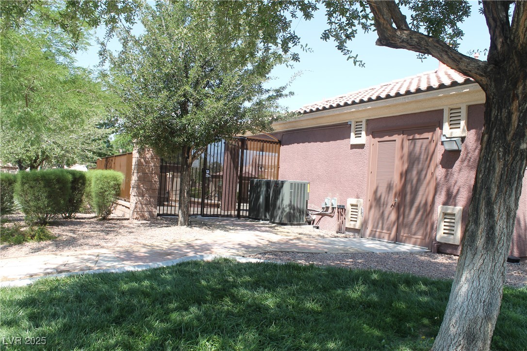 7352 Ravines Avenue Las Vegas, NV 89131 - Photo 22 of 93 View of yard featuring a patio area