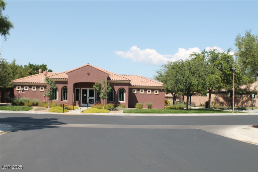 7352 Ravines Avenue Las Vegas, NV 89131 - Photo 26 of 93 Mediterranean / spanish home featuring stucco siding and a tile roof