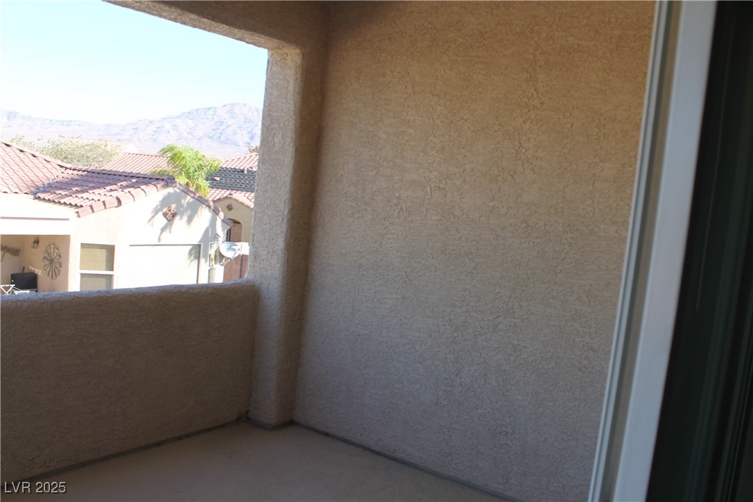 7352 Ravines Avenue Las Vegas, NV 89131 - Photo 35 of 93 Balcony featuring a mountain view