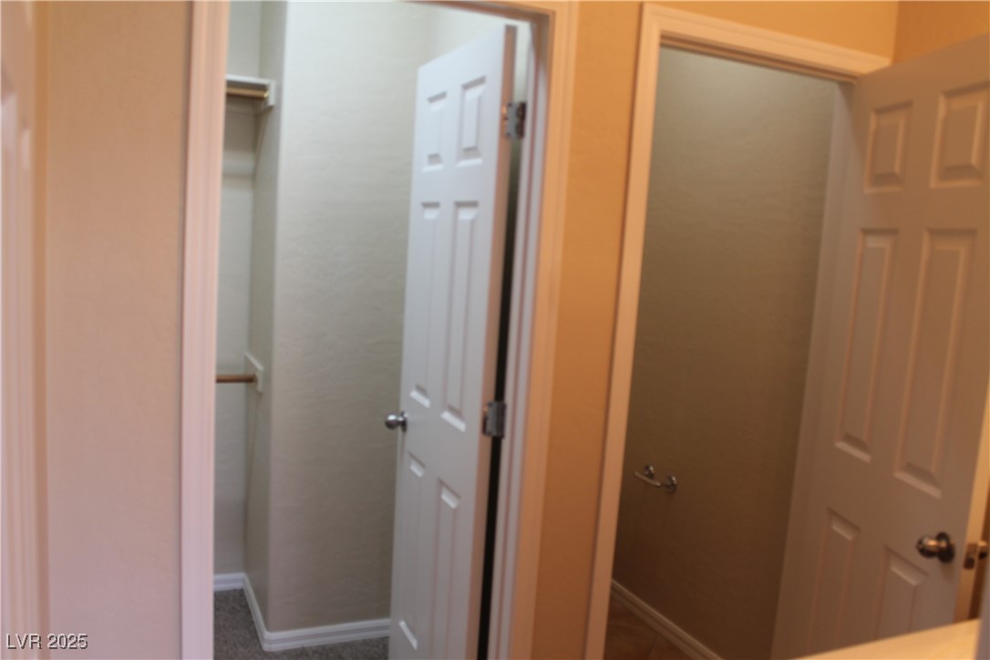 7352 Ravines Avenue Las Vegas, NV 89131 - Photo 57 of 93 Bathroom with baseboards