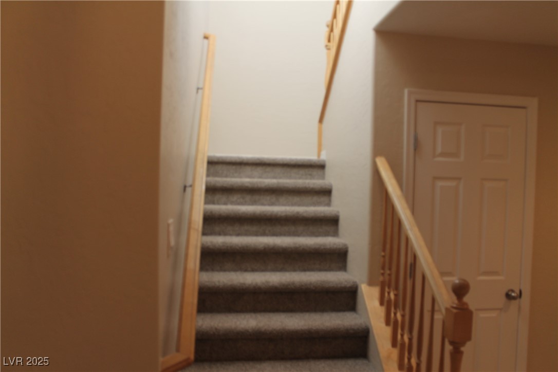 7352 Ravines Avenue Las Vegas, NV 89131 - Photo 75 of 93 Stairway featuring carpet