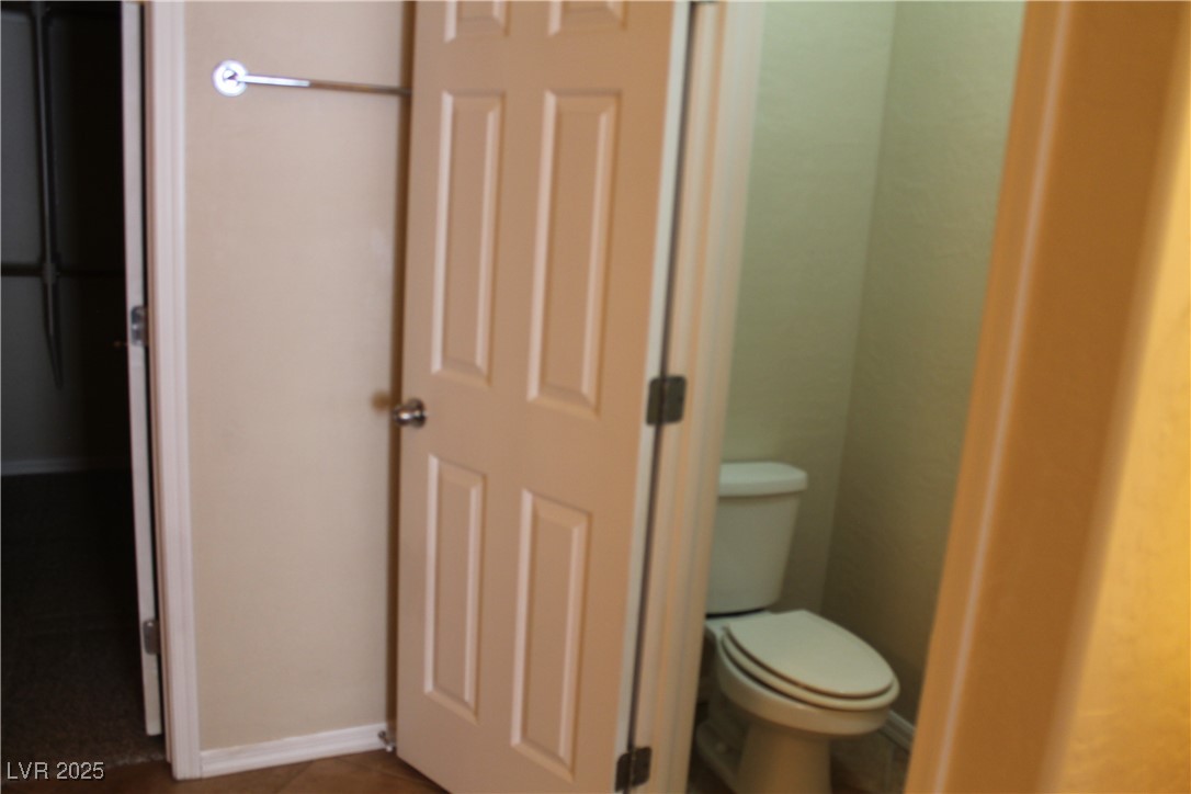 7352 Ravines Avenue Las Vegas, NV 89131 - Photo 82 of 93 Bathroom with toilet and tile patterned floors