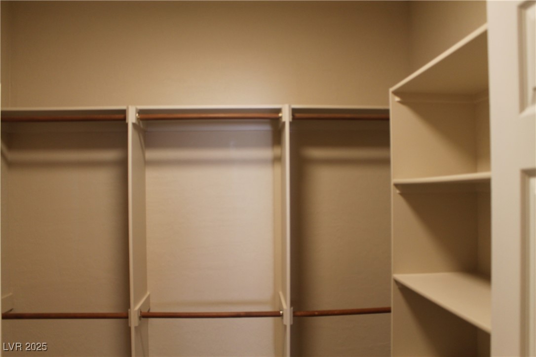 7352 Ravines Avenue Las Vegas, NV 89131 - Photo 92 of 93 View of walk in closet