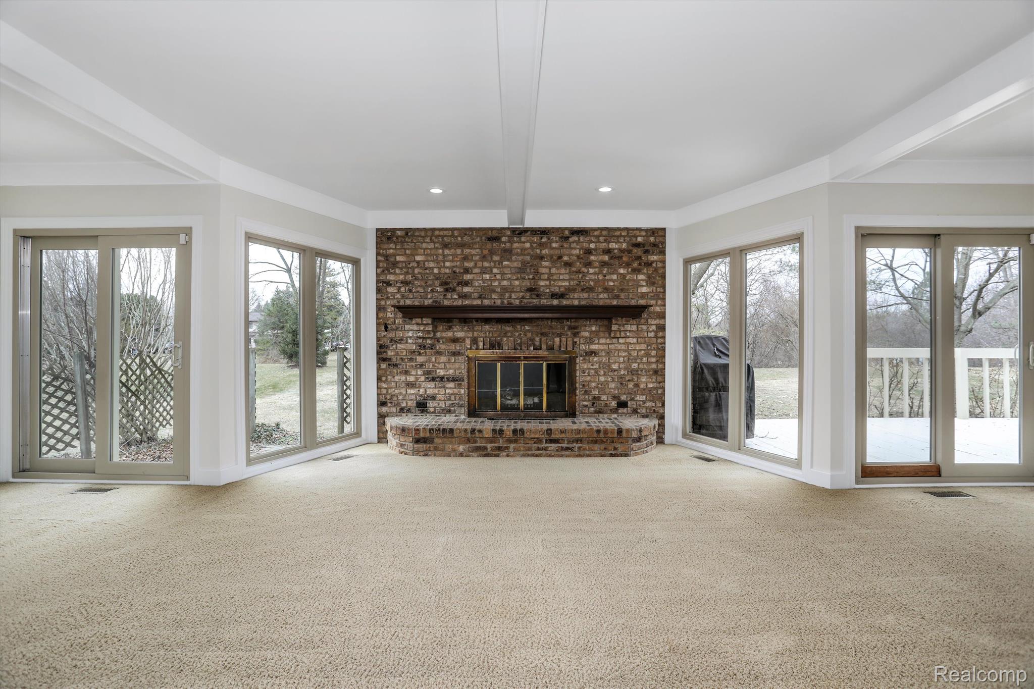 29477 Parkside Farmington, MI 48331 - Photo 10 of 36 Family room with fireplace