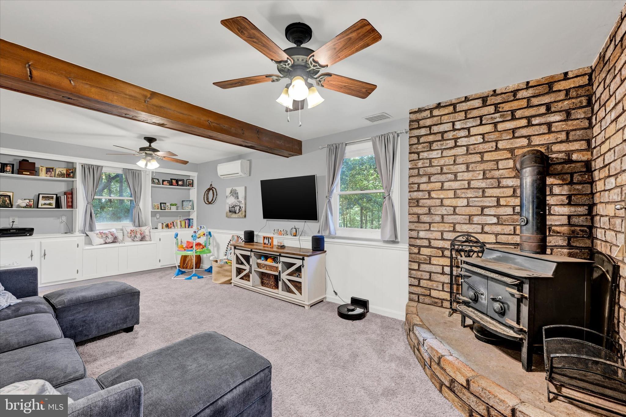 20 Houcksville Road South Hampstead, MD 21074 - Photo 15 of 37 a living room with furniture and a flat screen tv