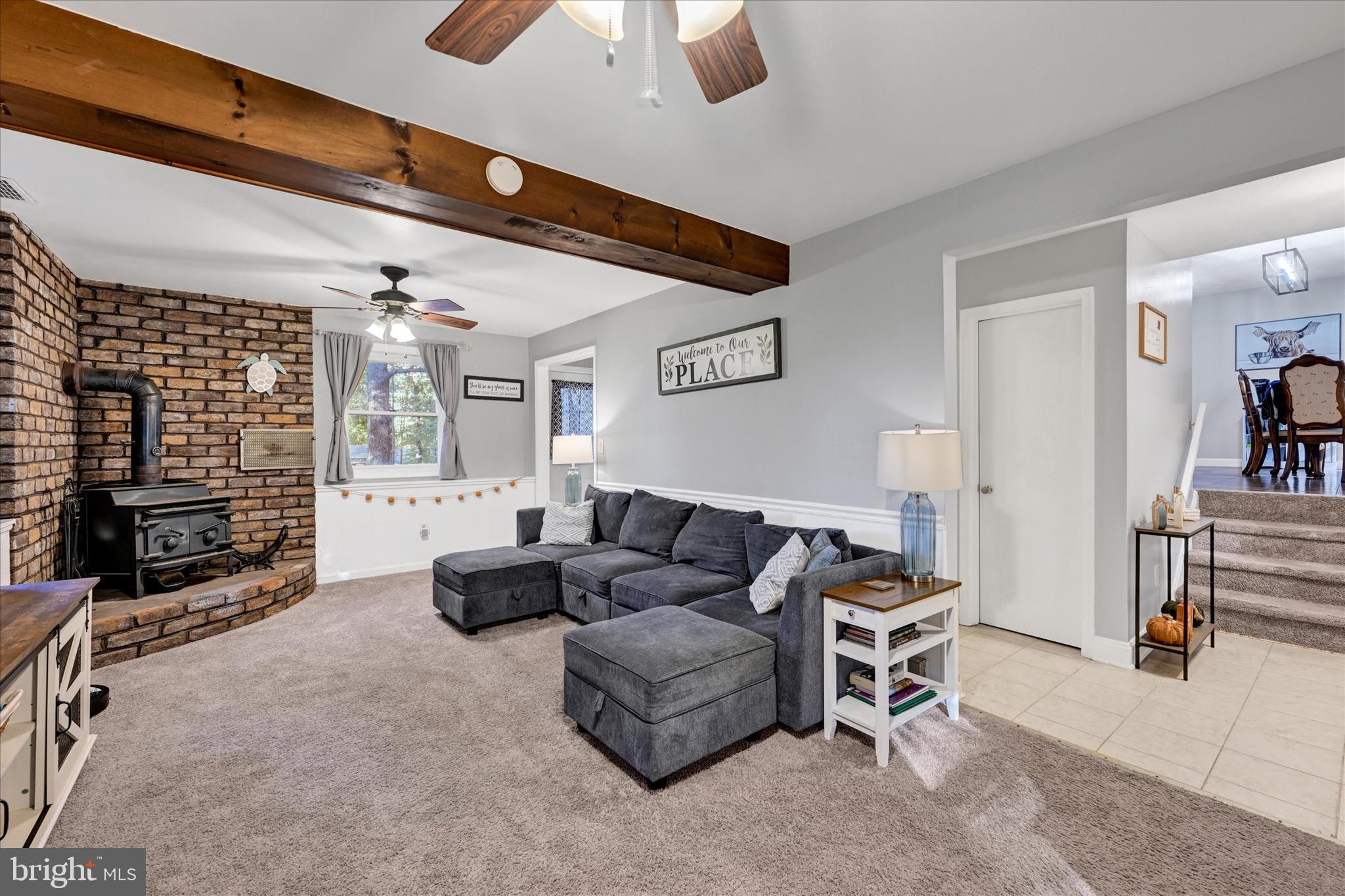 20 Houcksville Road South Hampstead, MD 21074 - Photo 17 of 37 a living room with furniture a rug and white walls