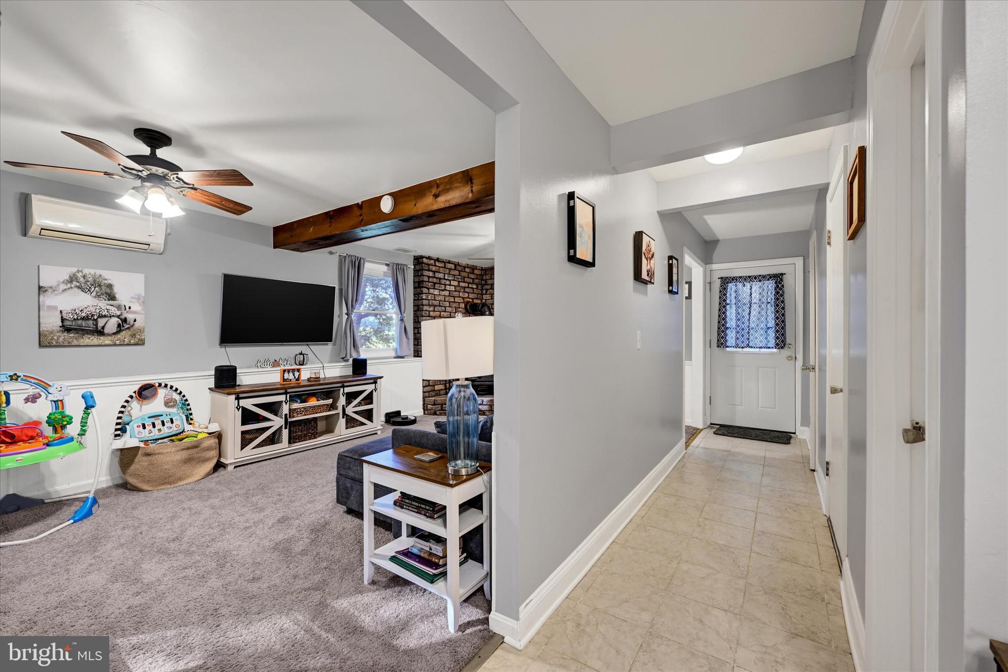 20 Houcksville Road South Hampstead, MD 21074 - Photo 18 of 37 a view of a livingroom with furniture and a flat screen tv