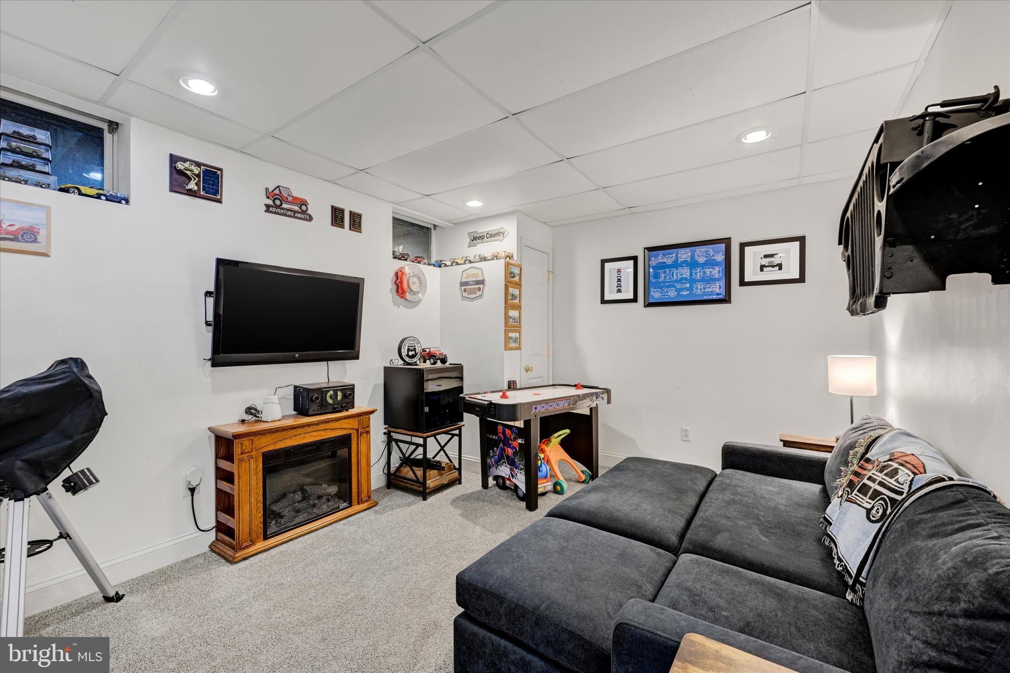 20 Houcksville Road South Hampstead, MD 21074 - Photo 26 of 37 a living room with furniture and a flat screen tv