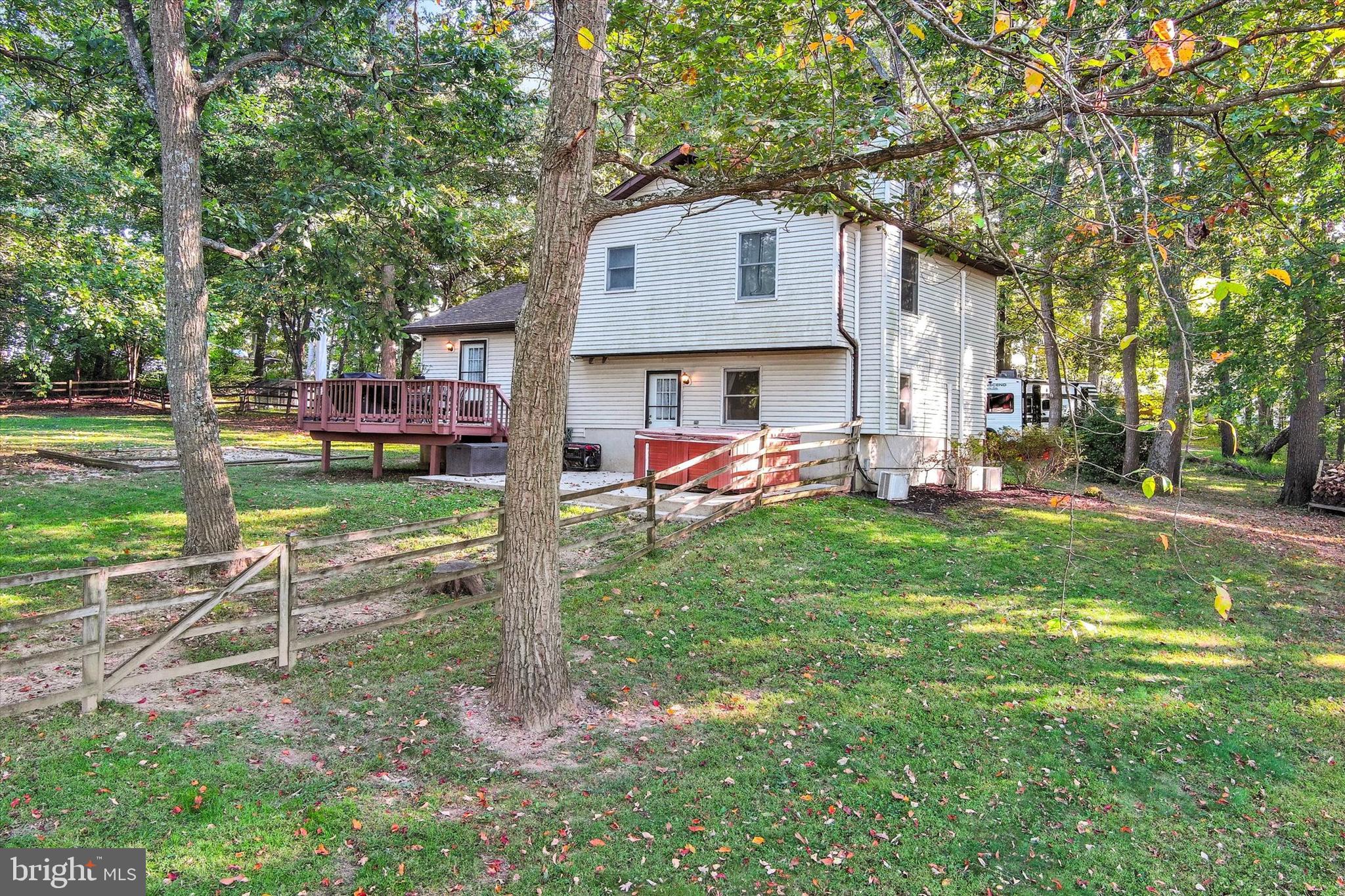 20 Houcksville Road South Hampstead, MD 21074 - Photo 32 of 37 a front view of a house with a yard porch and a tree