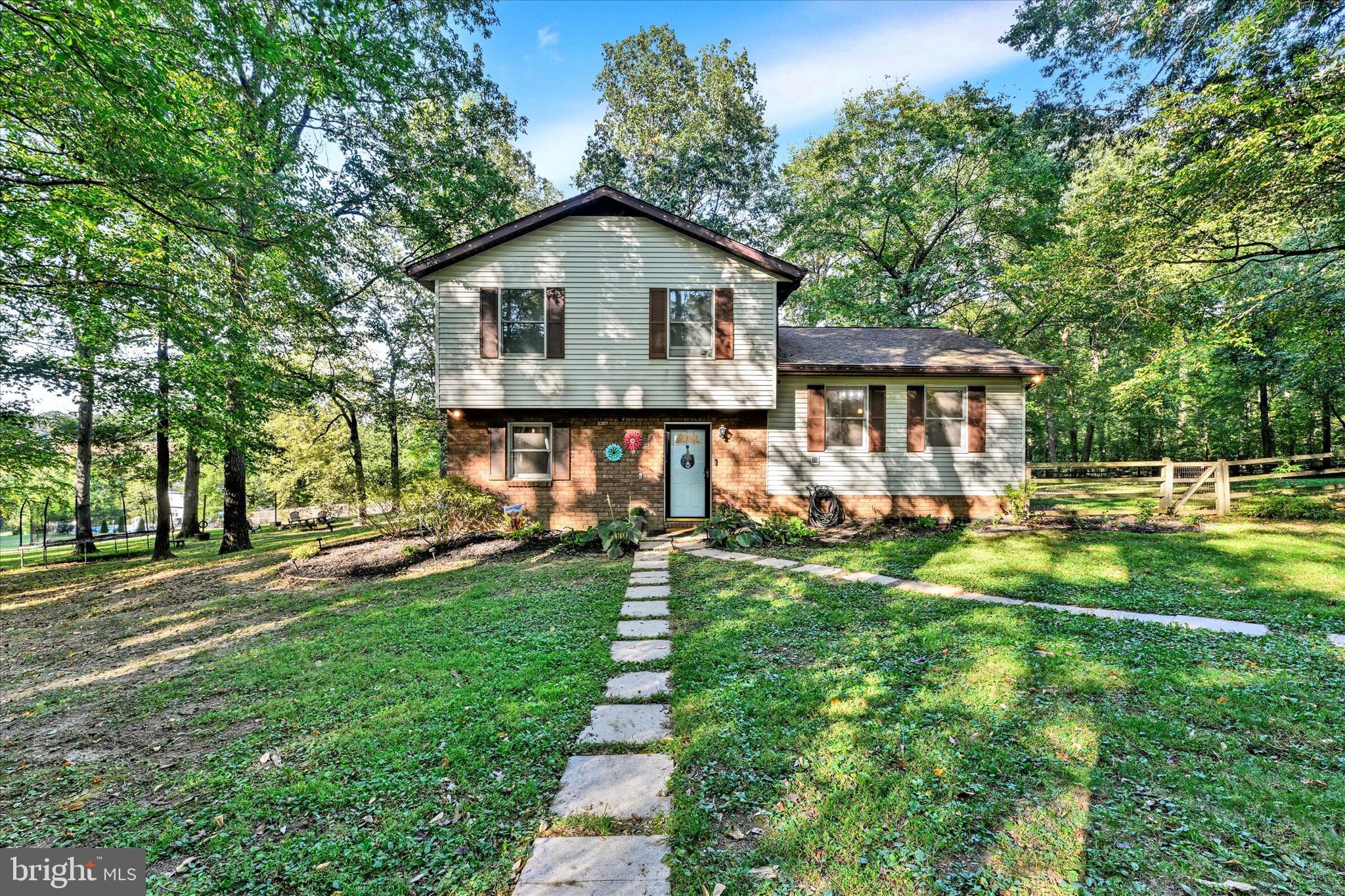 20 Houcksville Road South Hampstead, MD 21074 - Photo 37 of 37 a view of a house with a yard and sitting area