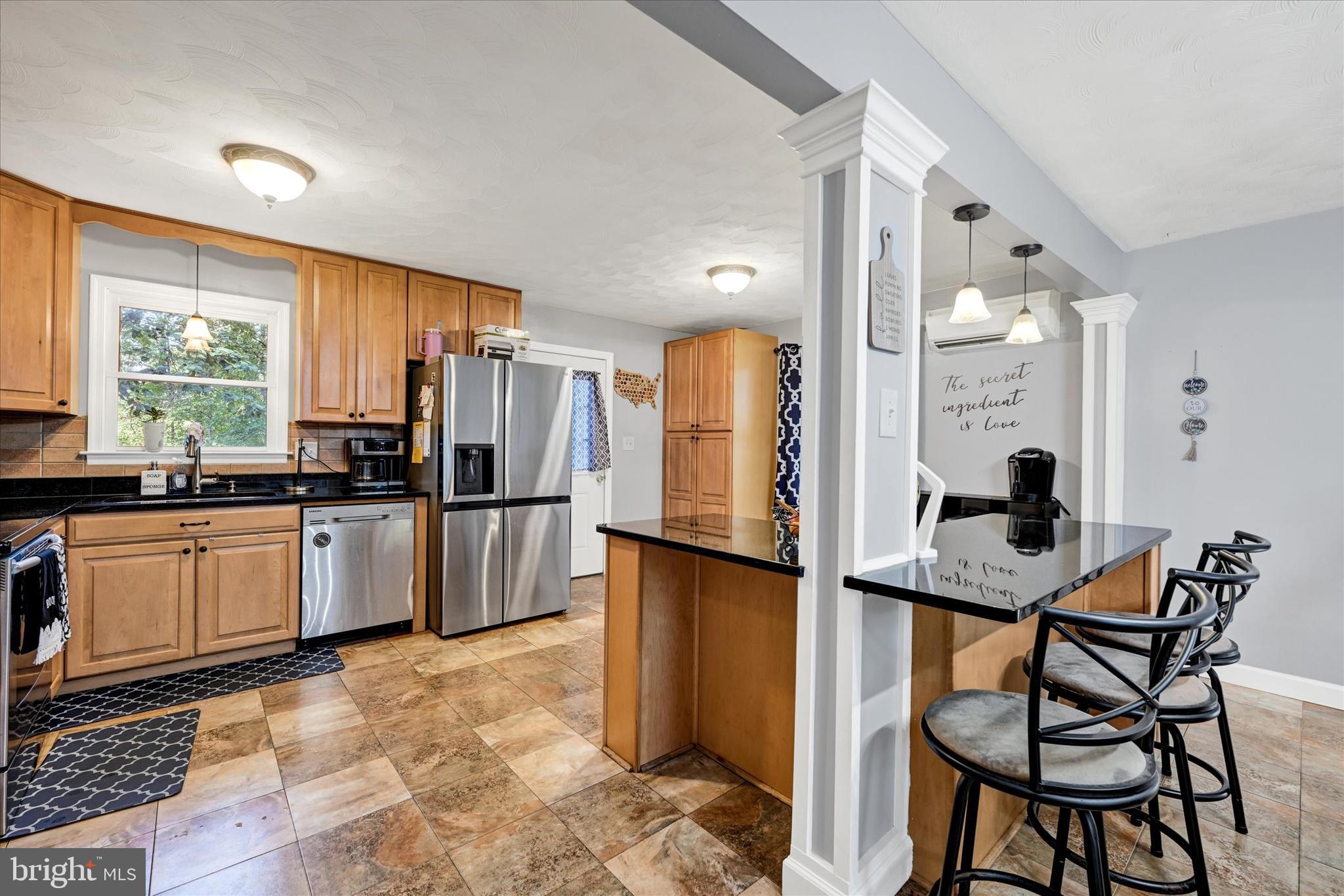 20 Houcksville Road South Hampstead, MD 21074 - Photo 10 of 37 a kitchen with refrigerator and cabinets