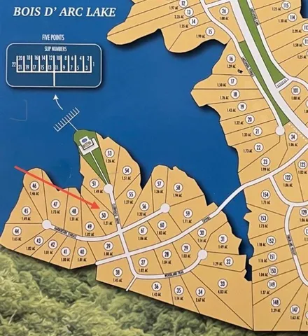 a view of a golf course with a lake