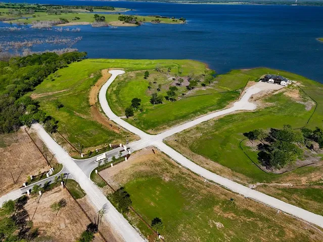 a view of a swimming pool with a garden