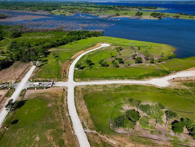 a view of a swimming pool with an outdoor seating